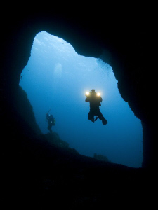 entrance of a cave called swiss cheese by Roland Bach 
